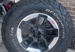 Set of 5 KO2 33″ tires (285/70r17) and factory Rubicon wheels