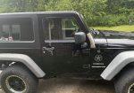 Black 2011 jeep sport
