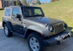 2010 Jeep Wrangler-3.8L V6, 6-speed manual, 68,195 miles, New tires & BesTop. Garage kept, manual doors & windows