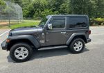 2020 Jeep Wrangler Sport on 14,000 miles. Like new several extras!