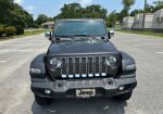 2020 Jeep Wrangler Sport on 14,000 miles. Like new several extras!