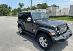 2020 Jeep Wrangler Sport on 14,000 miles. Like new several extras!