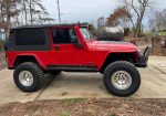 2005 LJ on brand new 35s and KMC beadlocks. All TNT armor