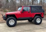 2005 LJ on brand new 35s and KMC beadlocks. All TNT armor