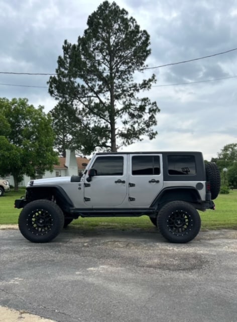 2014 Jeep Unlimited Rubicon 4D 4WD 3.6L Automatic/91,055 miles/ Clean blue title