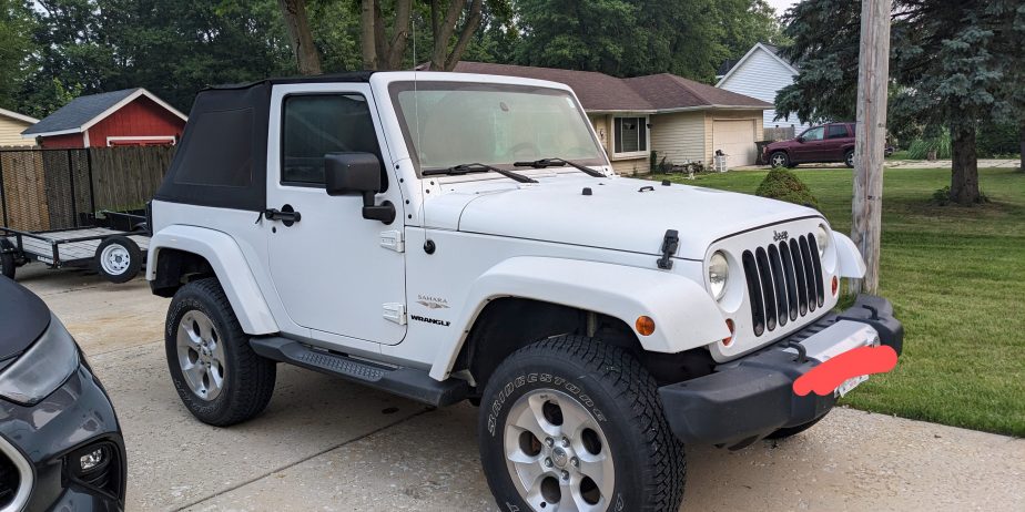 Jeep 2dr Sahara with newer engine w/ warranty. Clean title