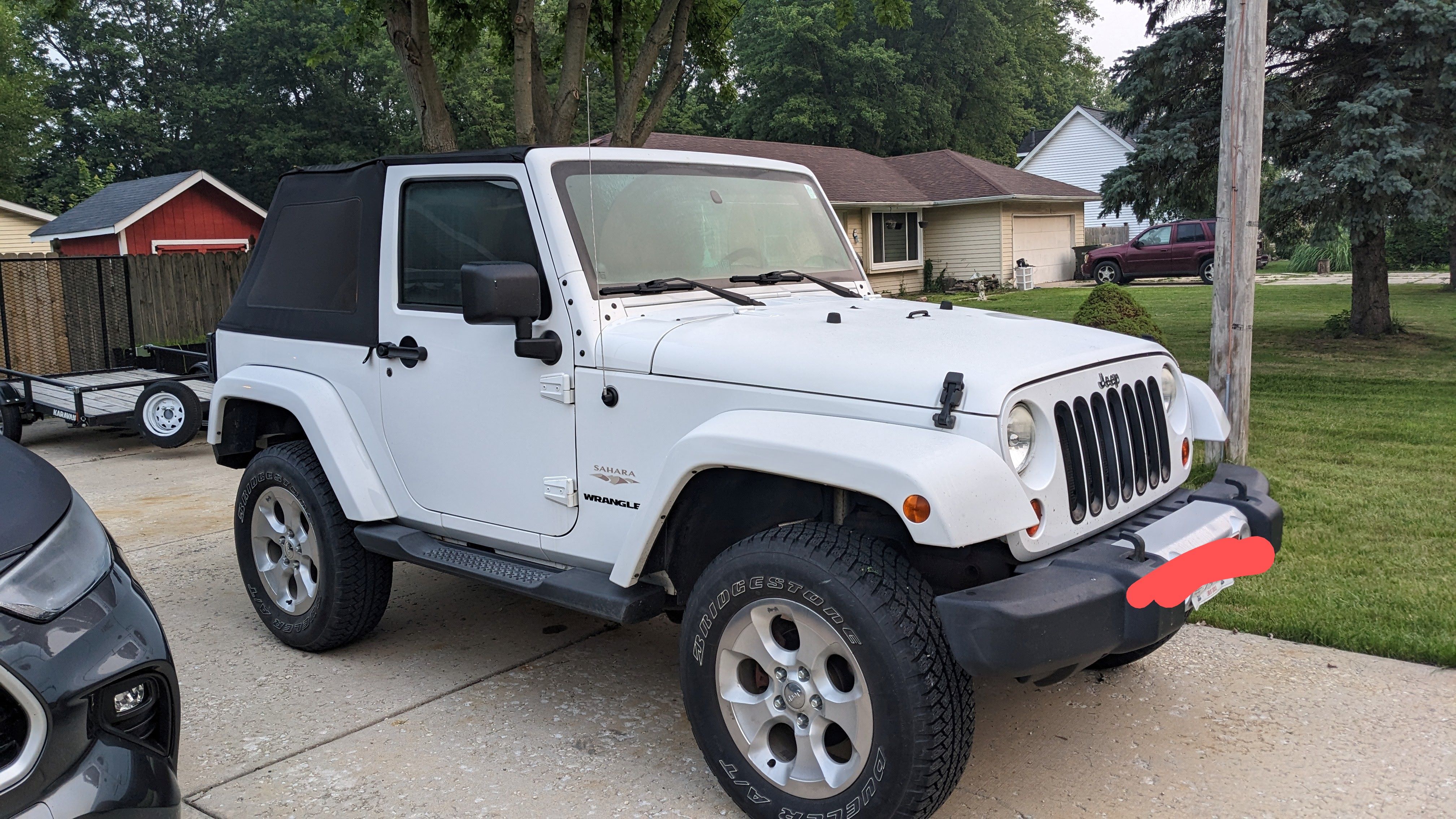 Jeep 2dr Sahara with newer engine w/ warranty. Clean title