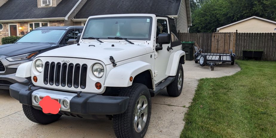 Jeep 2dr Sahara with newer engine w/ warranty. Clean title