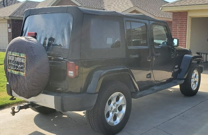 2013 Jeep Wrangler Sahara Stock soft top and frame