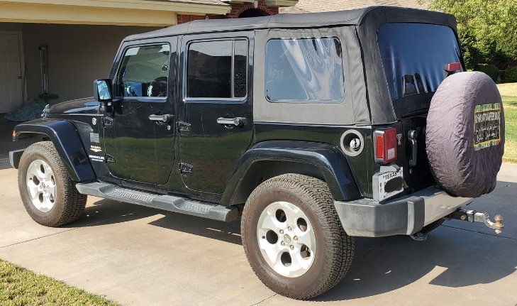 2013 Jeep Wrangler Sahara Stock soft top and frame