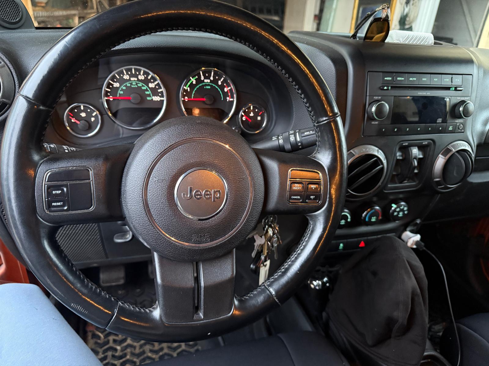 2011 Jeep Wrangler · Unlimited Sport SUV 4D