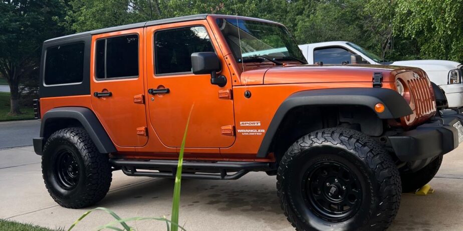 2011 Jeep Wrangler · Unlimited Sport SUV 4D