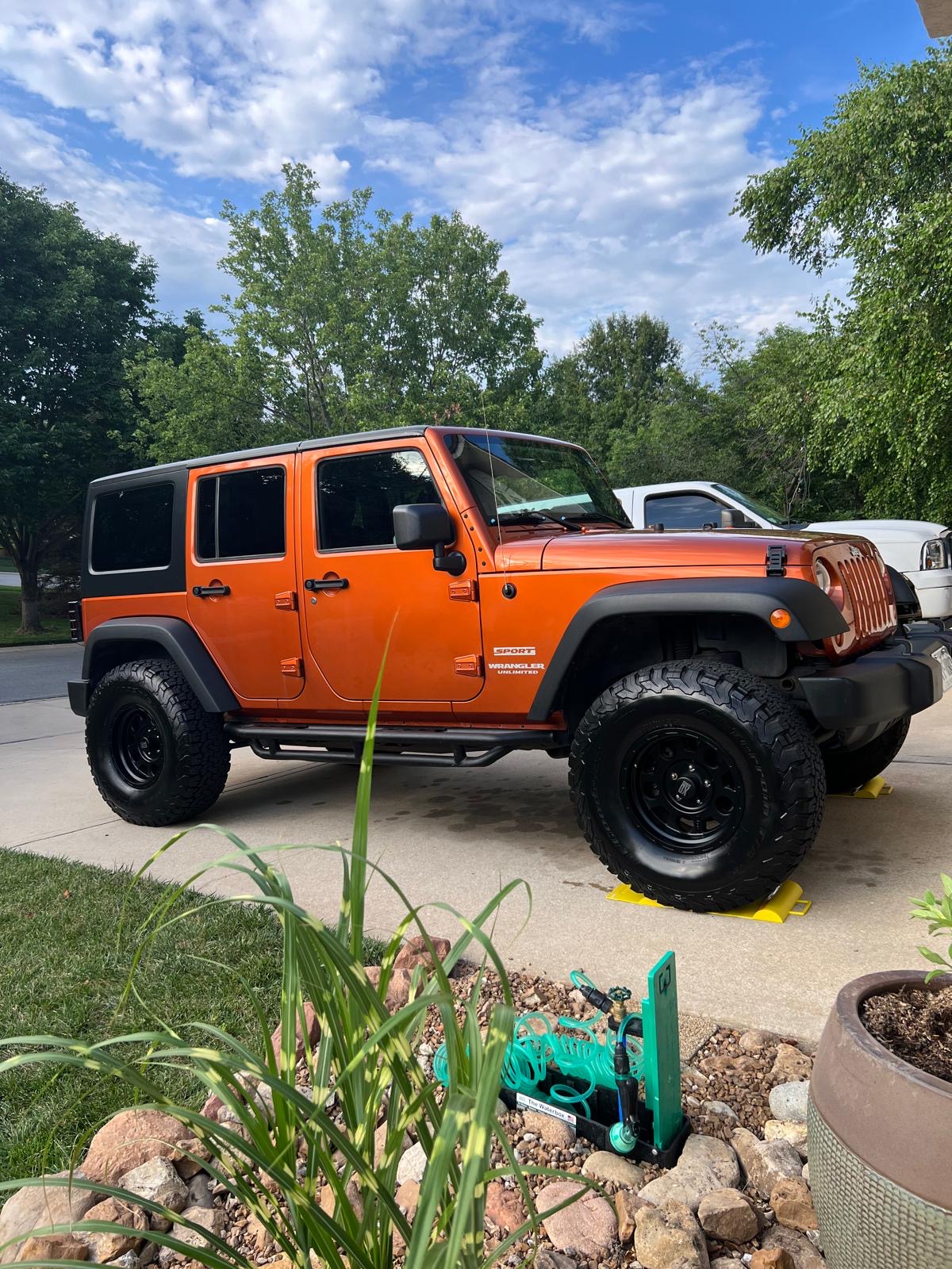 2011 Jeep Wrangler · Unlimited Sport SUV 4D