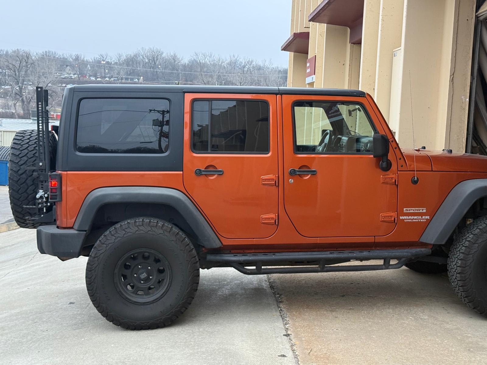 2011 Jeep Wrangler · Unlimited Sport SUV 4D
