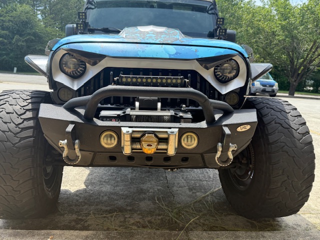 This 1 of a kind Jeep is custom from front to rear, top to bottom