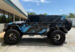 This 1 of a kind Jeep is custom from front to rear, top to bottom