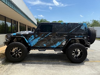 This 1 of a kind Jeep is custom from front to rear, top to bottom