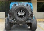 This 1 of a kind Jeep is custom from front to rear, top to bottom
