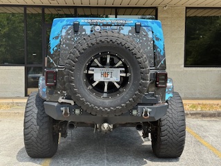 This 1 of a kind Jeep is custom from front to rear, top to bottom