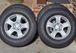 4 x Jeep Wheels/Tires 245/75 R17 – Stock Wheels/Bridgestone Dueler Tires