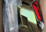 Outboard shock mount spacer relocation kit